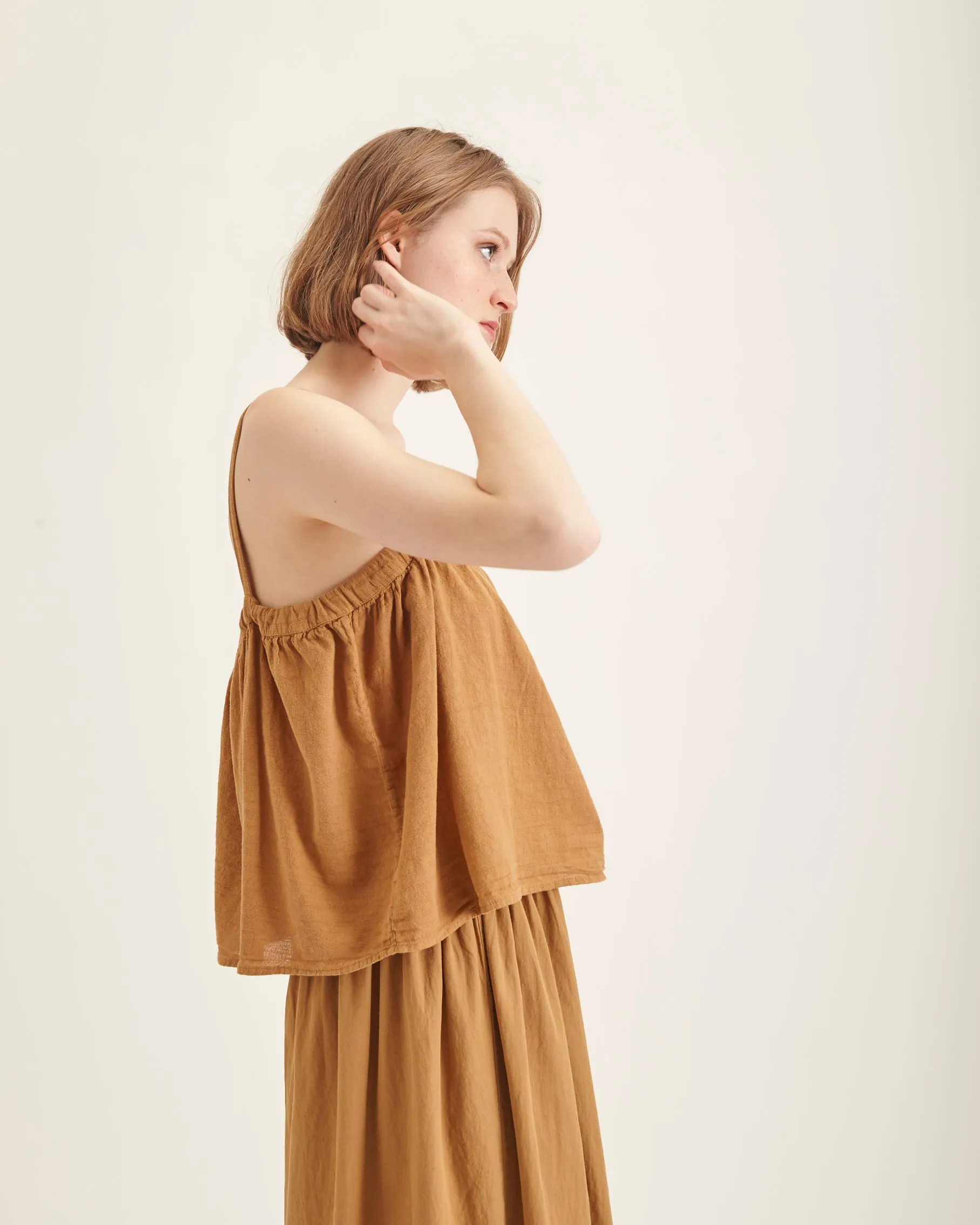 Bari top in dark gold
