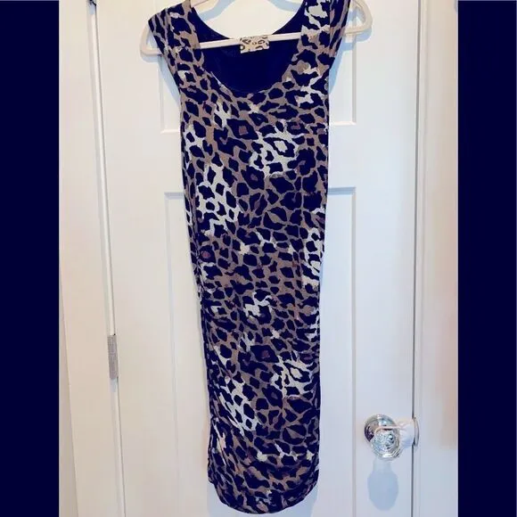 Jetset Leopard Cocktail Dress Medium (M) paired with Nine West Wristlet