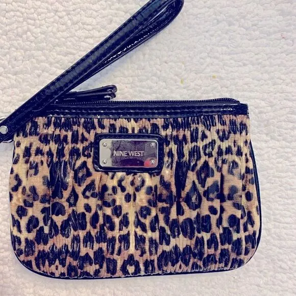 Jetset Leopard Cocktail Dress Medium (M) paired with Nine West Wristlet