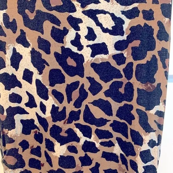 Jetset Leopard Cocktail Dress Medium (M) paired with Nine West Wristlet