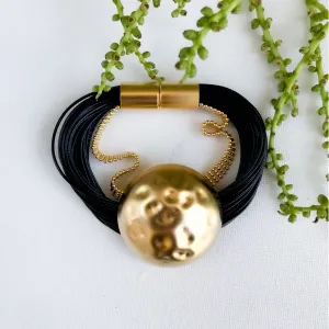 Kris - Bold black and gold pendant bracelet