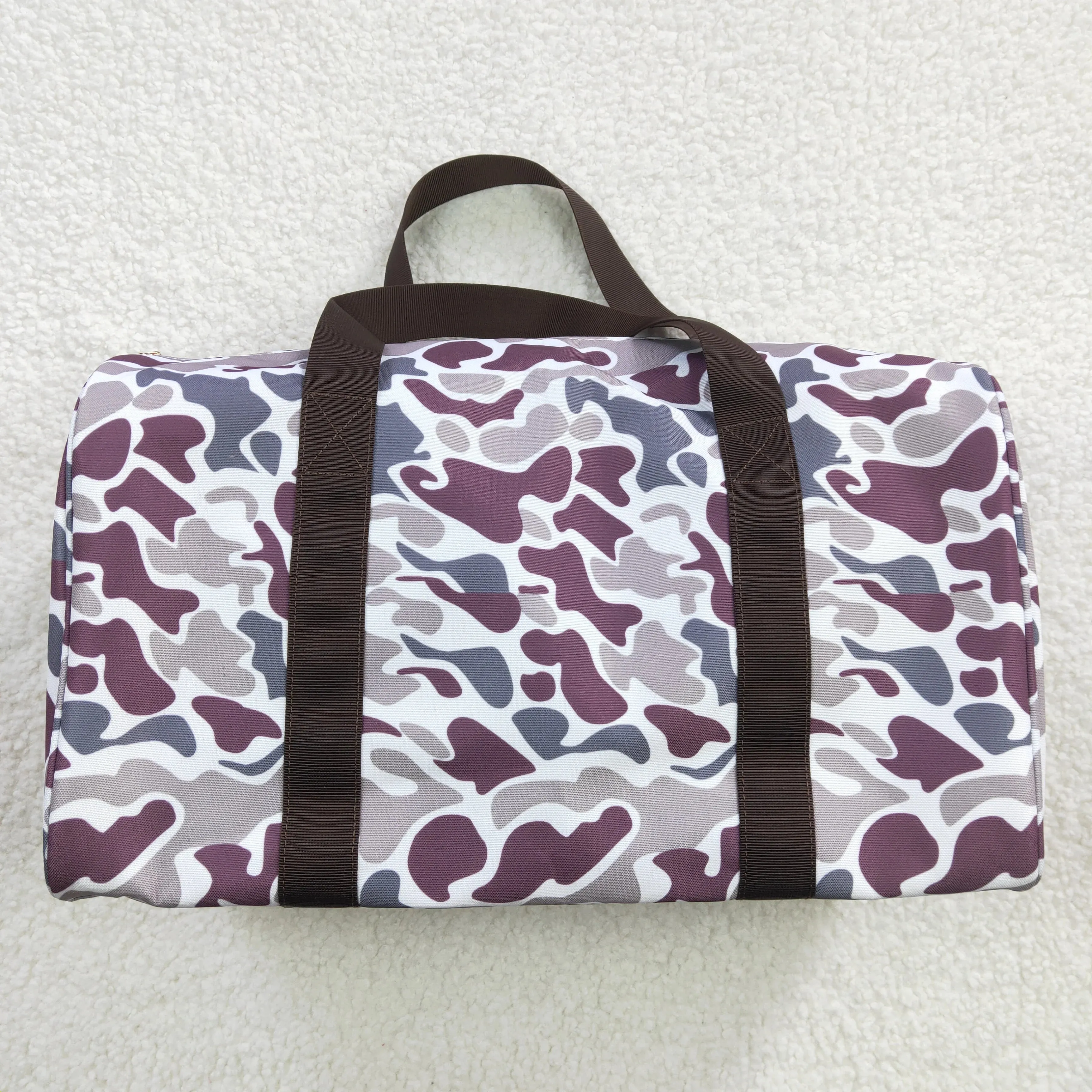 purple/blue Camo backpacks/duffles