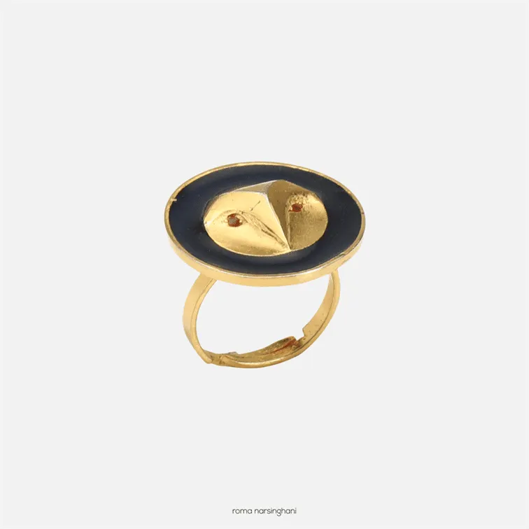 Roma Narsinghani Owl ring Ring The piece is set in brass, hand enameled with 18KT gold finesse. Each piece is unique and handcrafted by our artisans. RNLOVE08