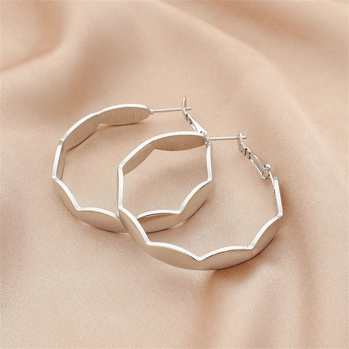 Silver-Plated Wave Hoop Earrings