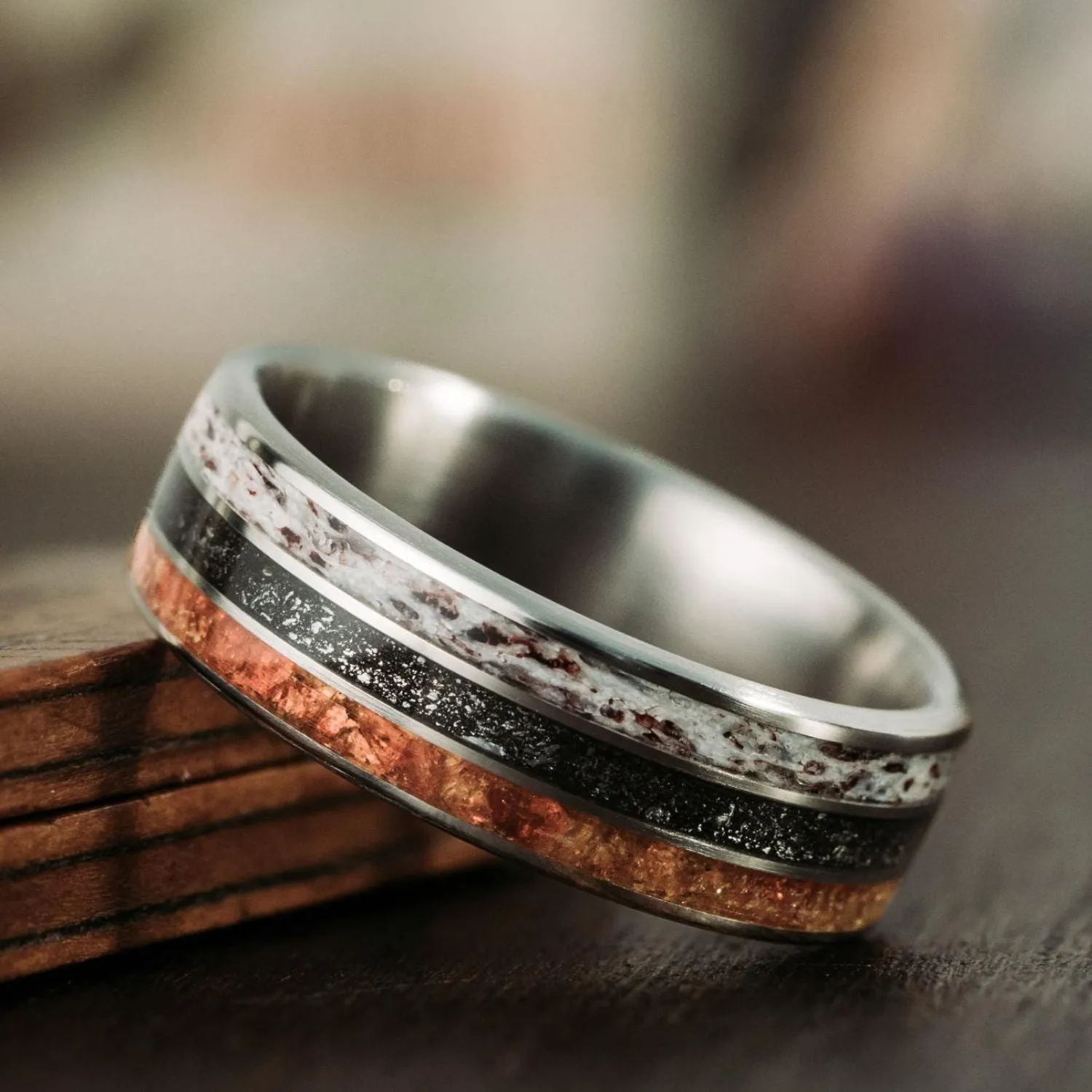 The Last Frontier | Men's Titanium Wedding Band with Elk Antler, Meteorite Dust, & Fossilized Amber