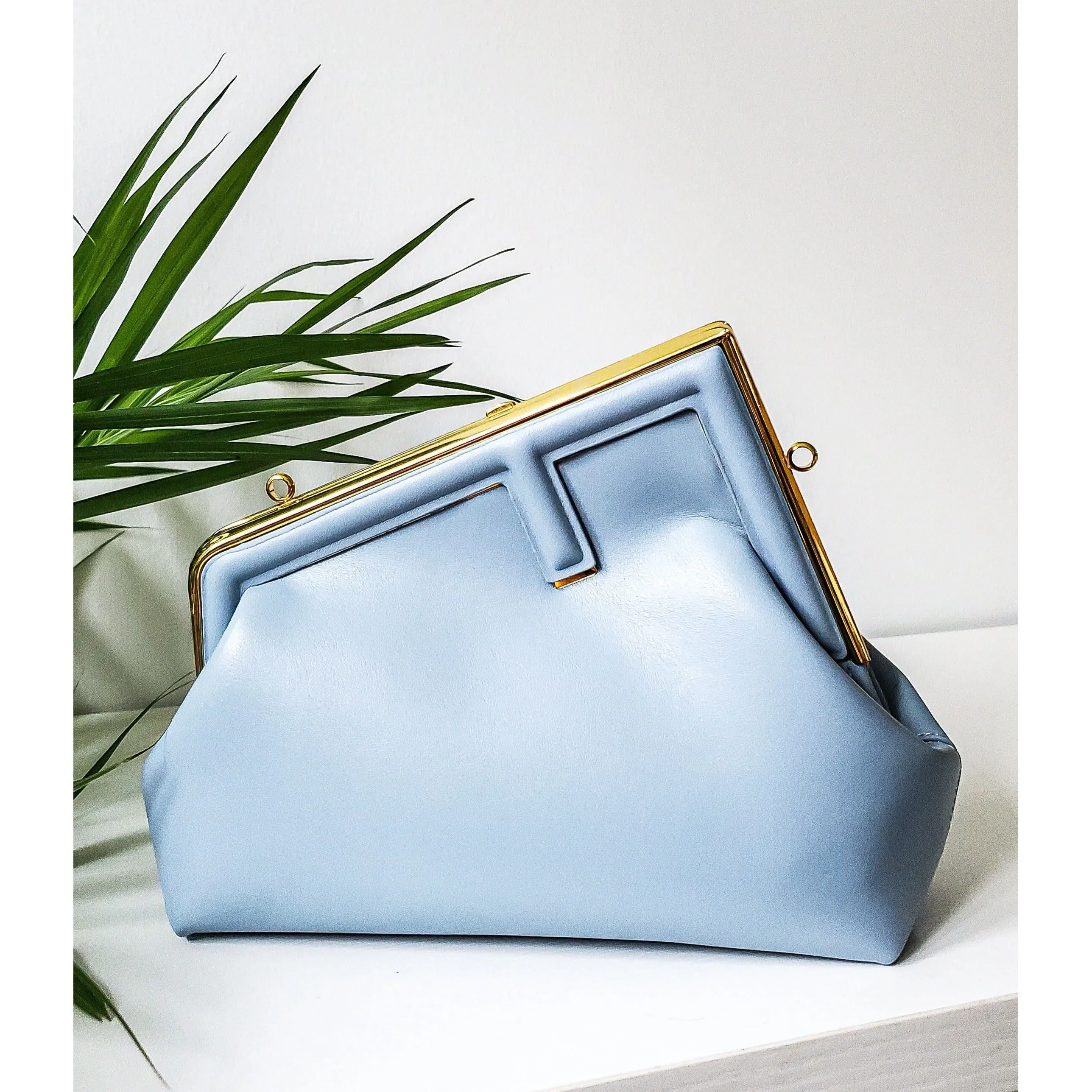 Trapezoid F Clutch Handbag