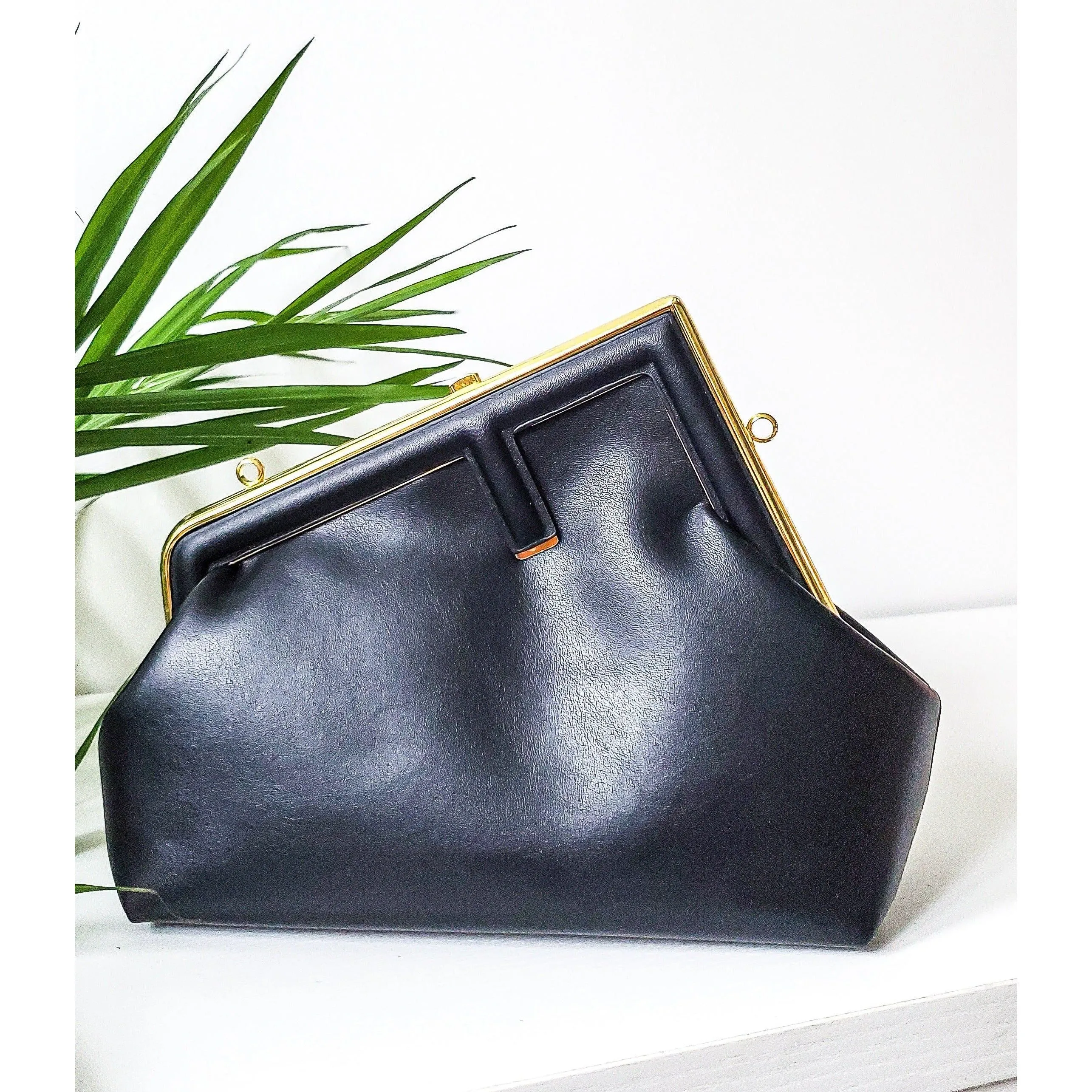 Trapezoid F Clutch Handbag